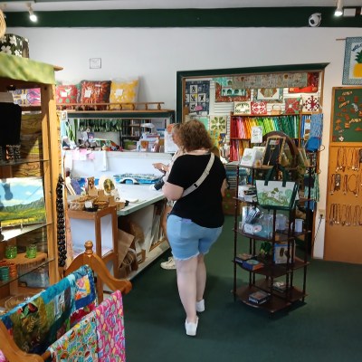 a person standing in front of a store