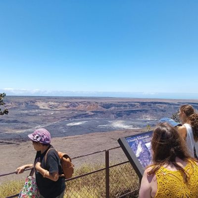a group of people flying a kite